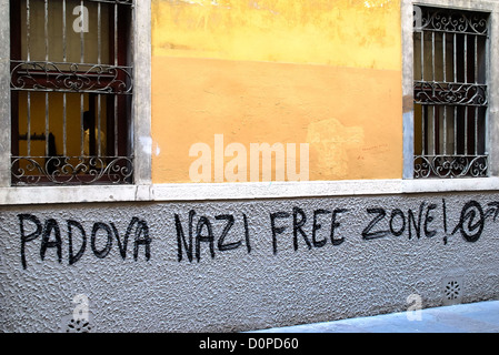 Italy : Graffito antinazi (against Nazi) on the wall of the Faculty of Political Science of the Padua University. Stock Photo