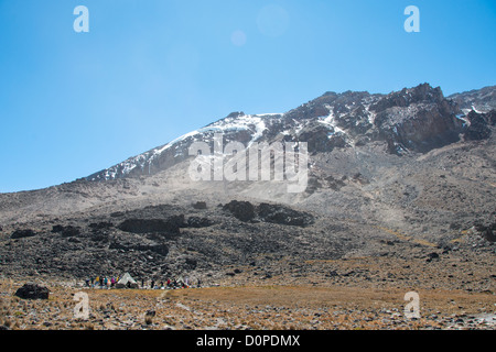 MT KILIMANJARO, Tanzania - A view looking back at Lava Tower Camp (15,200 feet) at left, with Kibo Summit and part of the Western Breach to the right. Mt Kilimanjaro. Stock Photo