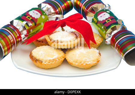 Plate of Mince Pies with Christmas Crackers Stock Photo