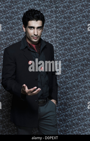 Portrait of a man throwing dices Stock Photo