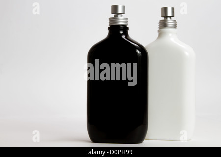 two bottle of parfum and spray on white background Stock Photo