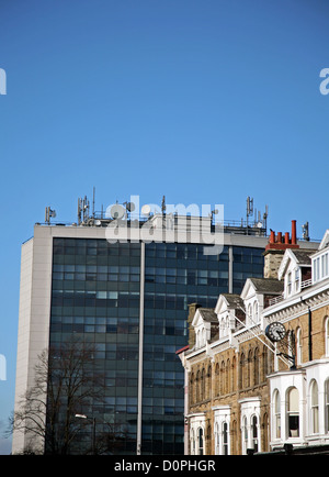 Telecom masts on Coptall Towers office block, in the center of Harrogate, UK Stock Photo