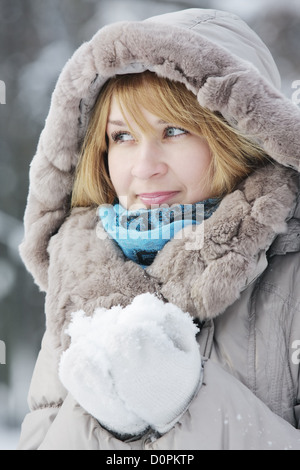 Blond woman with snow Stock Photo