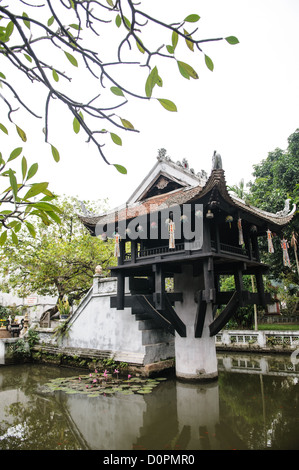 HANOI, Vietnam — The historic, small One Pillar Pagoda sits in the center of a small pond near the Ho Chi Minh Museum in the Ba Dinh district of Hanoi. It is one of the most iconic temples in Vietnam and dates back to the 11th century. Stock Photo