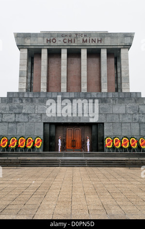 HANOI, Vietnam — Front of the exterior of the Ho Chi Minh Mausoleum with paved courtyard. A large memorial in downtown Hanoi surrounded by Ba Dinh Square, the Ho Chi Minh Mausoleum houses the embalmed body of former Vietnamese leader and founding president Ho Chi Minh. Stock Photo