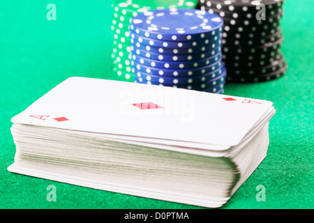 Card deck with chips behind Stock Photo