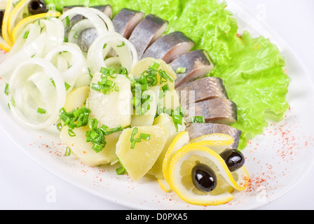 Herring with potato and vegetables Stock Photo