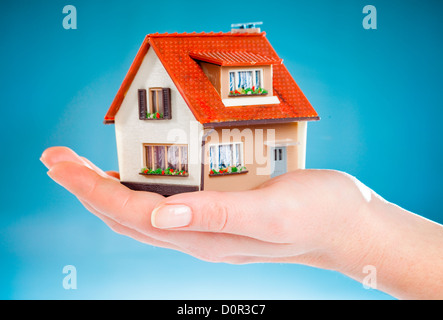 house in human hands Stock Photo