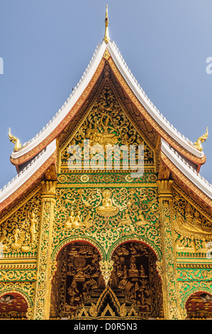LUANG PRABANG, Laos - Top of the Haw Pha Bang (or Palace Chapel) at the Royal Palace Museum in Luang Prabang, Laos. The chapel sits at the northeastern corner of the grounds. Construction started in 1963. Stock Photo