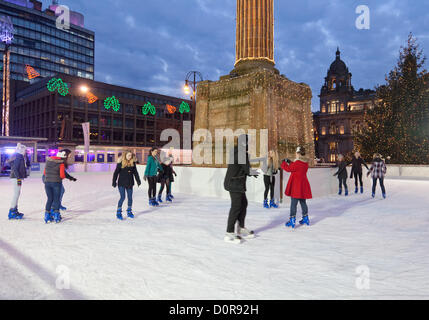 Glasgow, Scotland, UK. Young people skating in George Square in central Glasgow where an ice-rink was opened on 24th November 2012 and will continue until 6th January 2012. Photo taken on 29th November 2012. Stock Photo