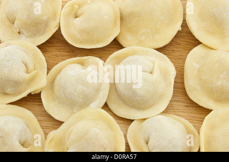 Dumplings on the board, pelmeni Stock Photo