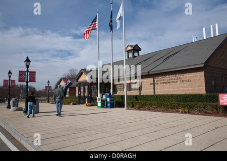 A statue of Johnny Appleseed welcomes visitors to the Massachusetts Visitor Center in Lancaster, Massachusetts. Stock Photo