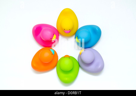 6 different colors bathroom ducks get together and form a star shape Stock Photo