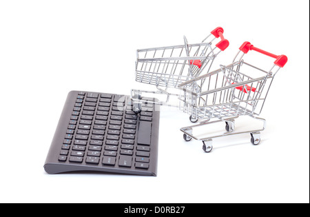 Computer keyboard with shopping carts Stock Photo