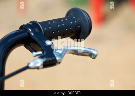 handle of a bike with the brake lever Stock Photo