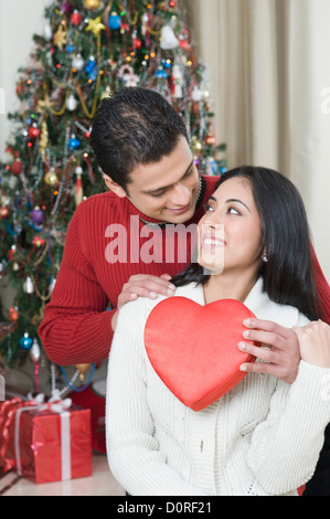 Man giving a present to a woman Stock Photo