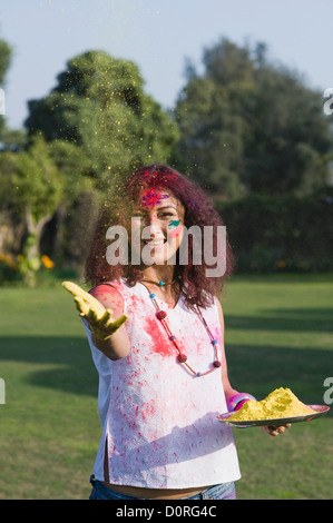 Woman celebrating Holi Stock Photo