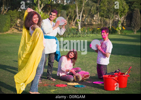 Friends celebrating Holi Stock Photo