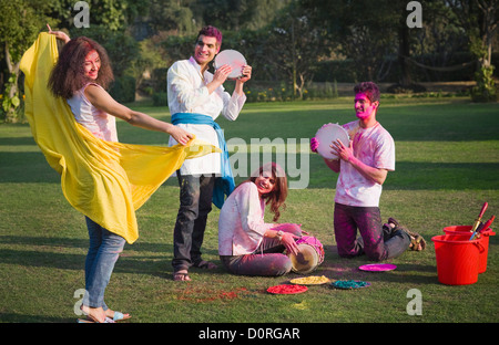 Friends celebrating Holi Stock Photo
