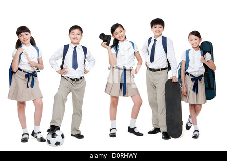 Happy schoolchildren and their leisure interests Stock Photo