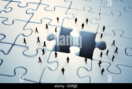 Tiny people jigsaw puzzle Stock Photo