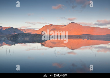 Rannoch Moor in Scotland and the Black Mount reflected in Lochan Na h-Achlaise. Stock Photo