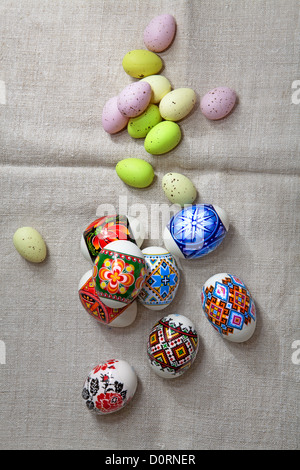 Painted Colorful Easter Eggs on linen fabric Stock Photo
