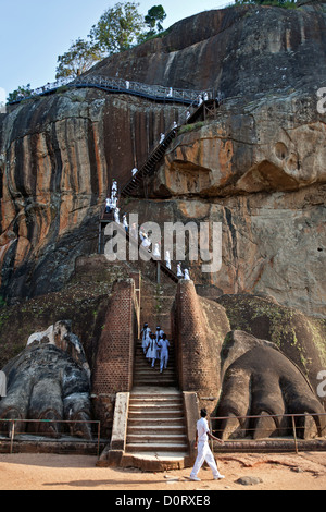 Students descending the stairs. The Lion´s paws. Sigiriya Rock. Sri Lanka Stock Photo