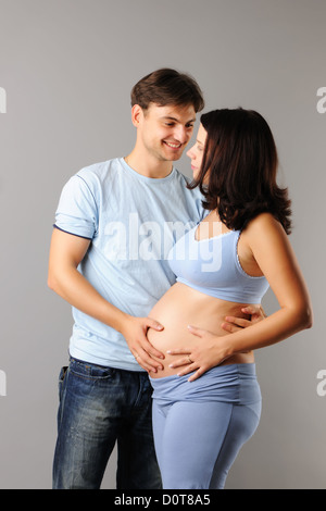 Couple handsome man and pregnant woman taking self portrait Stock Photo ...