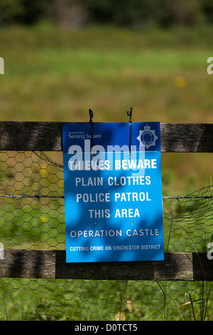 Warning sign 'thieves beware plain clothes Police parrol this area' Stock Photo