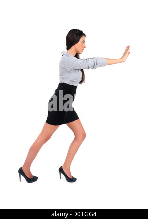 Isolated young business woman push something Stock Photo