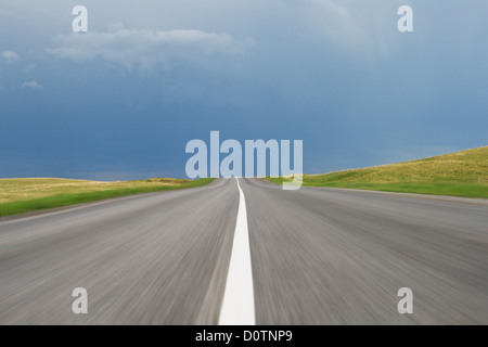 Empty asphalt blurry road with dark sky Stock Photo