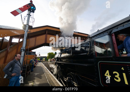 Ivatt class 4 number 43106 Steam Locomotive on the West Somerset Railway pulling away from Williton station. Stock Photo