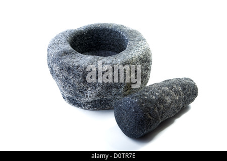 Granite mortar and pestle isolated Stock Photo