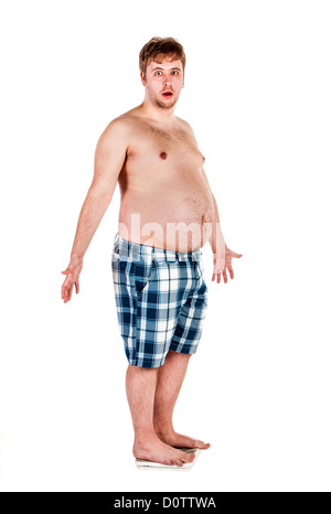 Overweight, fat man and scales. Stock Photo