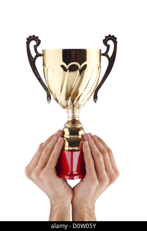 Hands with winners cup on white Stock Photo