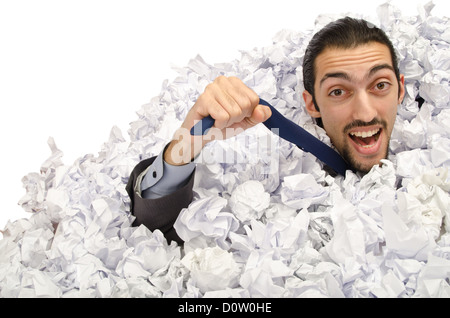 Man with lots of crumpled paper Stock Photo