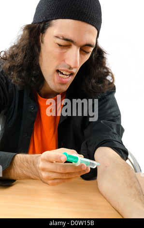 Drug addict during injection Stock Photo