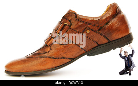 Woman domination concept with shoes and man Stock Photo - Alamy