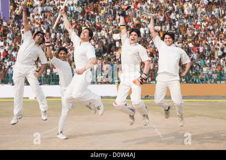 Cricket players celebrating their success Stock Photo