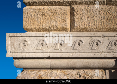 Ancient wall in sandstone and marble with decorations in Verona - Italy Stock Photo