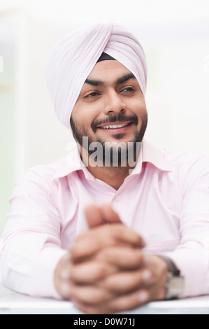 Businessman smiling and looking away Stock Photo