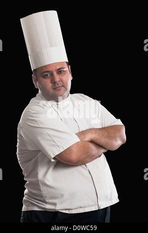Portrait of a chef standing with his arms crossed Stock Photo