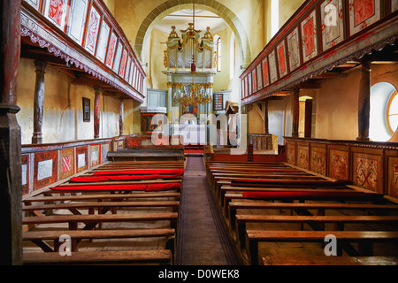 Interior of Viscri fortified church in Transylvania, Romania. It is a UNESCO World Heritage site. Stock Photo