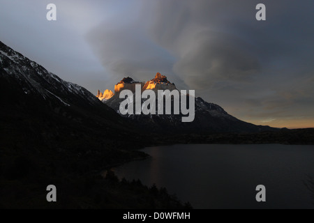 Illuminating the towers at Torres Del Paine National Park Stock Photo