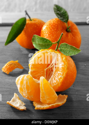 Fresh manderins fruits with leaves. Stock Photo