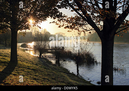 2nd December 2012. Hampton Court, SW London, UK. Sunrise over the River Thames at Hampton Court Bridge. Stock Photo