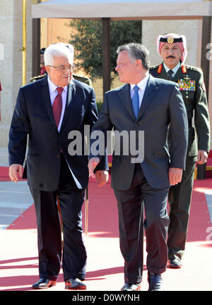 Palestinian President Mahmoud Abbas (L) meets with Jordan King Abdullah II (R) in Amman, Jordan on 2nd December 2012. Abbas stopped in Jordan on his way to Ramallah from New york after a vote on a resolution to upgrade the status of the Palestinian Authority to a non member observer state during the 67th session of the United Nations General Assembly. Stock Photo