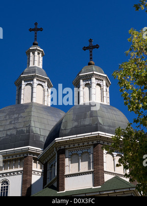 Two Domes with Crosses. Two domes topped with iron crosses atop the Ukrainian Catholic Cathedral in Edmonton. Stock Photo