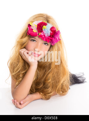 children fashion blond girl with spring flowers on head over white Stock Photo
